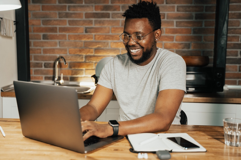 Man typing on computer